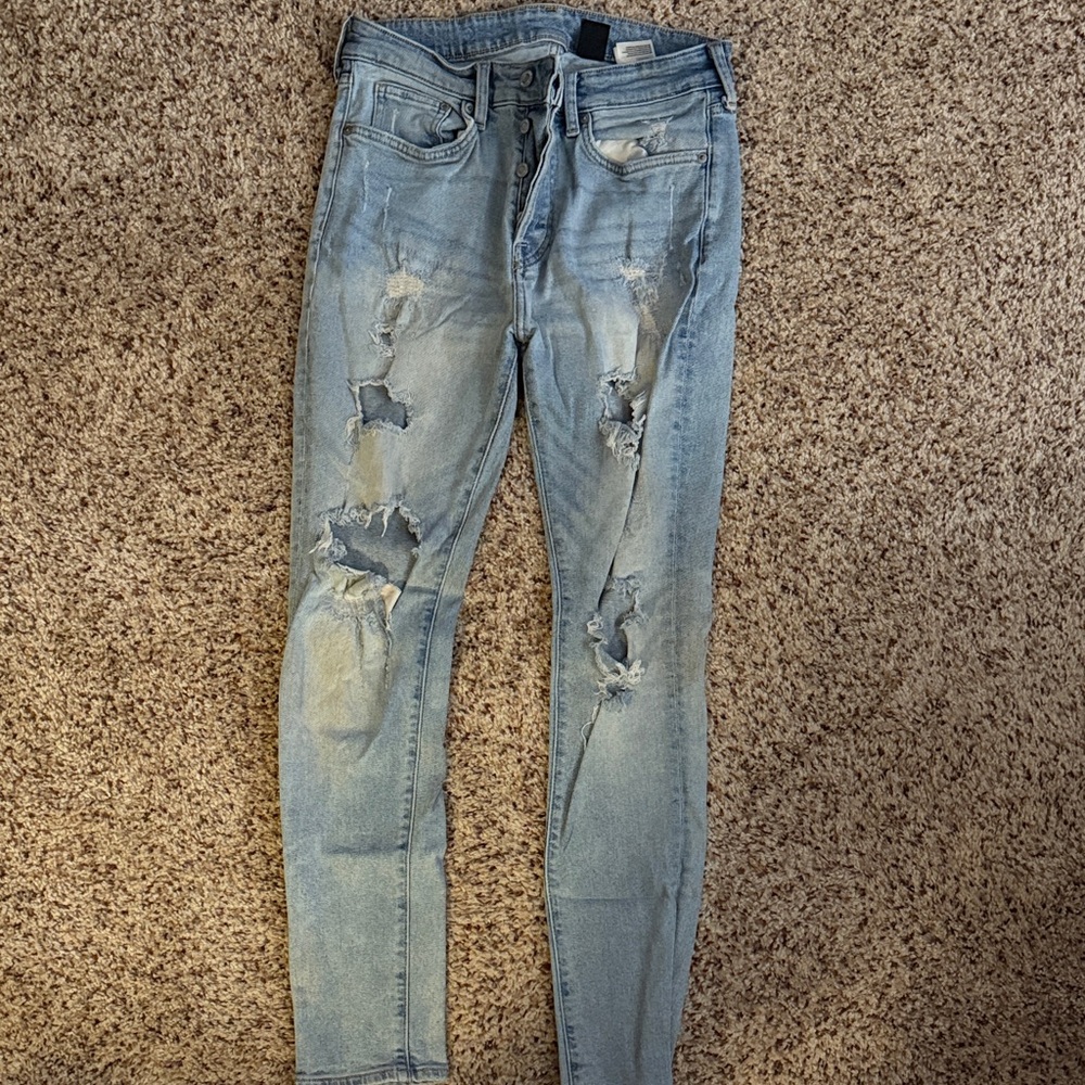 Distressed Light Blue Jeans